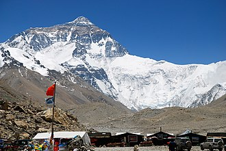 Mt. Everest Base Camp with snow capped mountain peak in the background 
